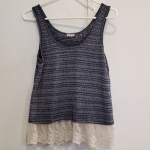 Junior size M undershirt with lace trim around the bottom